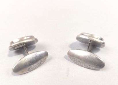 Pair of cufflinks adorned with onyx cabo...