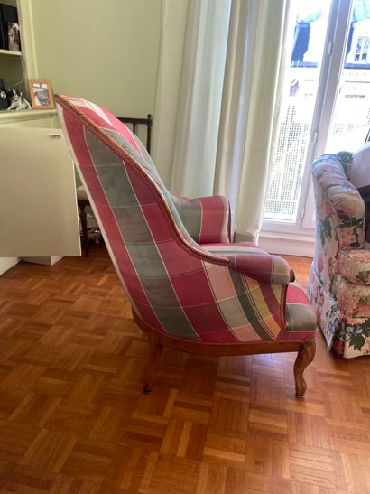 Bergère en placage, reposant sur des pieds...