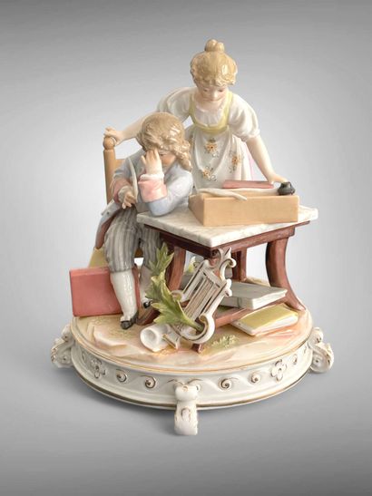La leçon.
Groupe en porcelaine polychrome...
