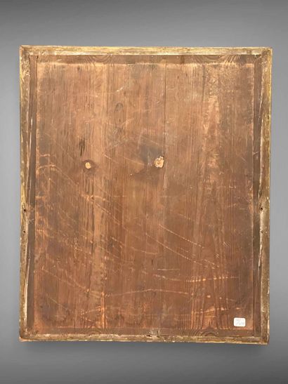 Miroir en bois doré à décor en relief de...