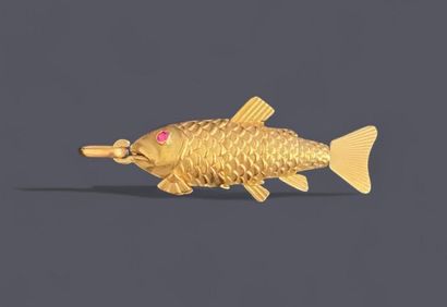 18k (750 thousandths) gold pendant forming...