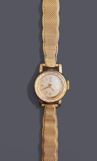 UTI 
Ladies' watch in 18k (750 thousandths)...