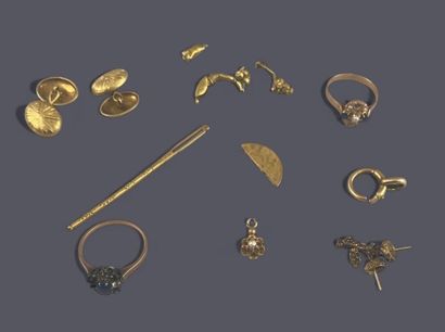 Lot in 18k (750 thousandths) gold comprising:
-...