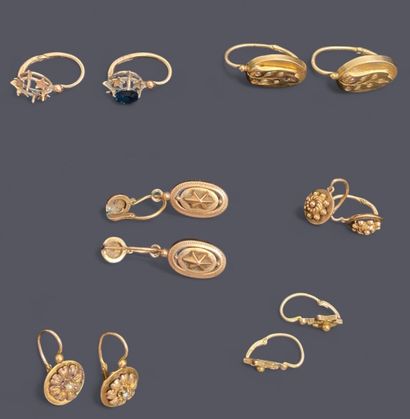 Seven pairs of 18k (750 thousandths) gold...