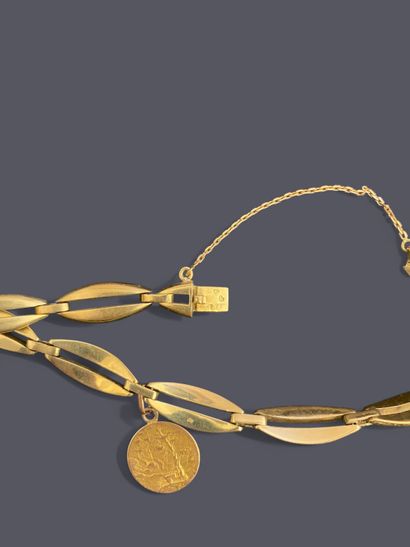 18k (750 thousandths) yellow gold openwork...