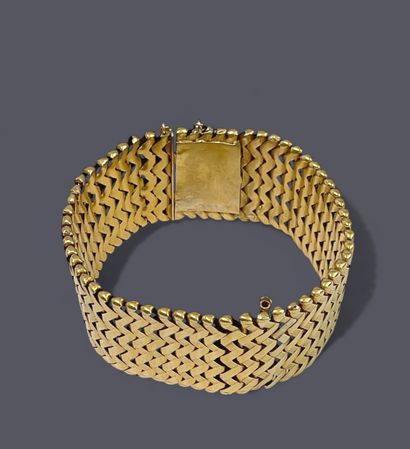 Ribbon bracelet in 18k (750 thousandths)...