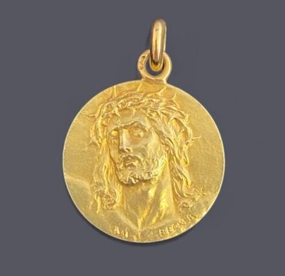 18k (750 thousandths) gold medal depicting...