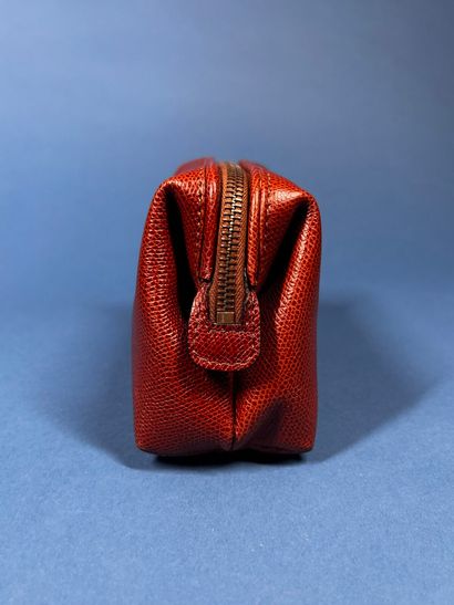 CÉLINE
Trousse en cuir grainé beige, pliable,...