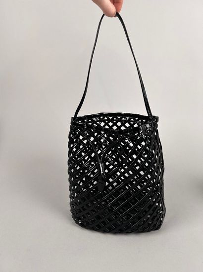 ALAIA Paris 
Small purse bag in openwork...
