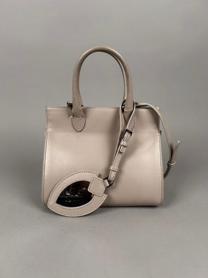 ALAIA Paris 
Small light gray leather handbag,...
