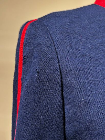 CHANEL Boutique 
Veste en jersey marine gansé...