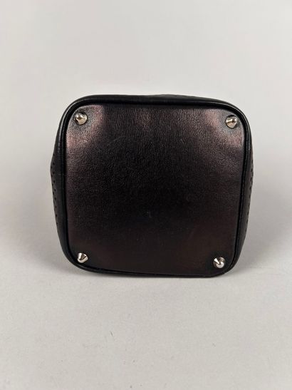 ALAIA Paris 
Mini handbag in perforated black...
