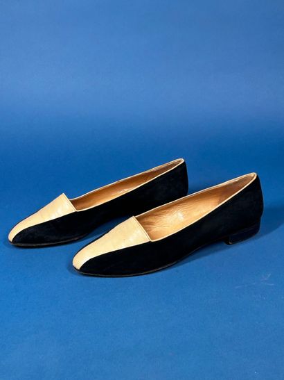 CHANEL 
Pair of black suede loafers with...