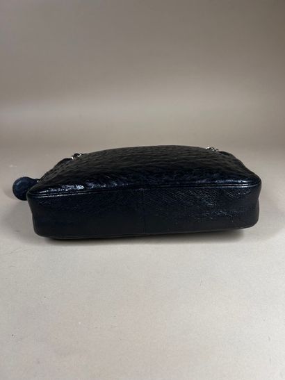 CHANEL 
Black ostrich leather 