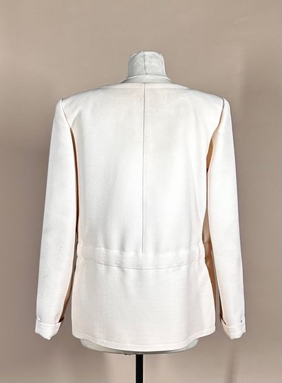 COURRÈGES Paris 
Veste en lainage ivoire...