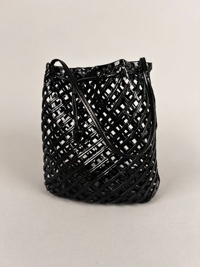 ALAIA Paris 
Small purse bag in openwork...