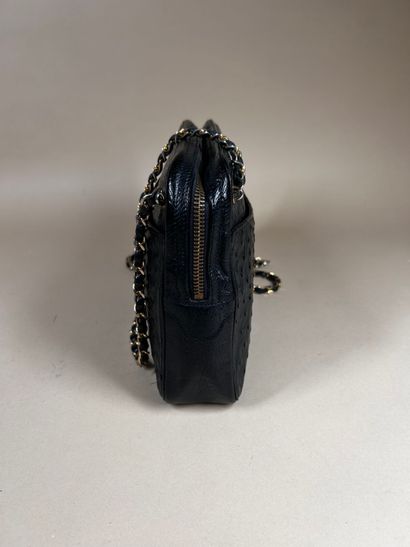 CHANEL 
Black ostrich leather 