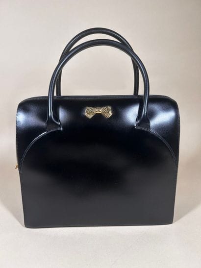 NINA RICCI
Sac porté main semi-rigide en...