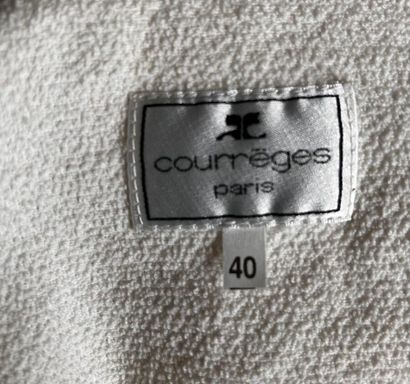 COURRÈGES Paris 
Imperméable en vinyle jaune...