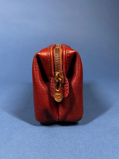 CÉLINE
Trousse en cuir grainé beige, pliable,...