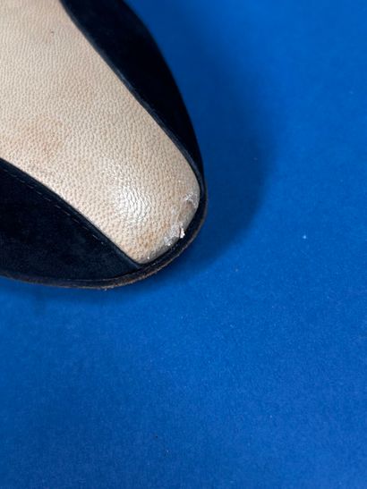 CHANEL 
Pair of black suede loafers with...