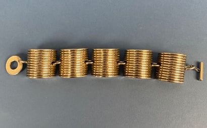 Dans le goût de Jean-Paul GAULTIER 
Bracelet...