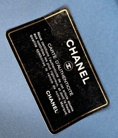 CHANEL 
Trousse de toilette en cuir matelassé...