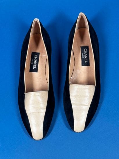CHANEL 
Pair of black suede loafers with...