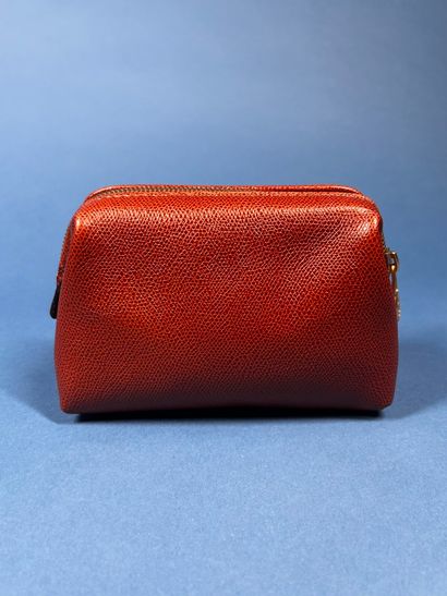 CÉLINE
Trousse en cuir grainé beige, pliable,...