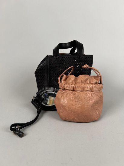 ALAIA Paris 
Mini handbag in perforated black...