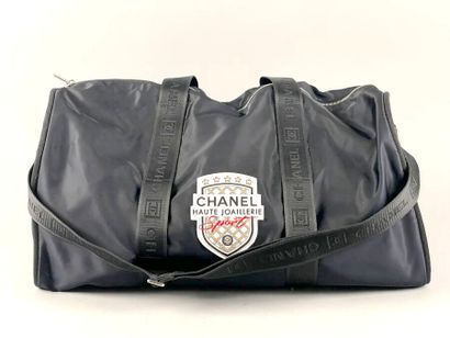 CHANEL
Midnight-blue polyamide sports bag,...