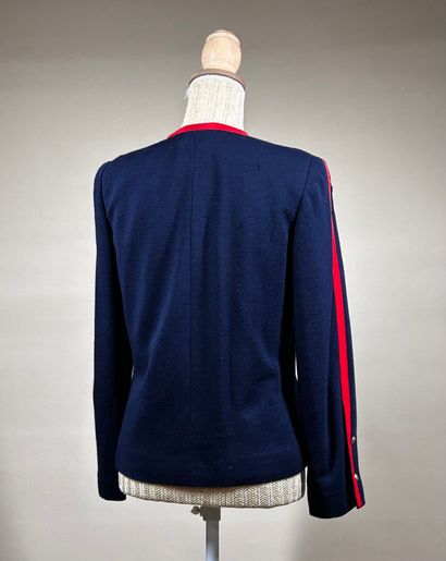 CHANEL Boutique 
Veste en jersey marine gansé...
