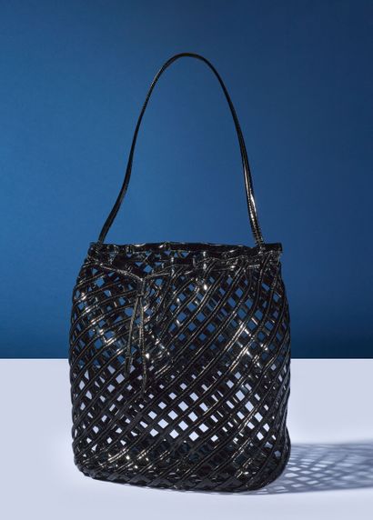 ALAIA Paris 
Small purse bag in openwork...