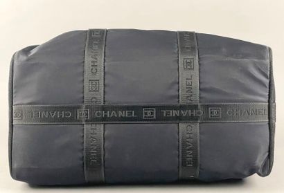 CHANEL
Midnight-blue polyamide sports bag,...