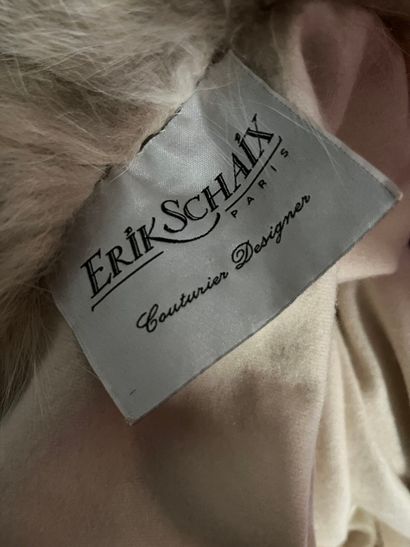 ERIK SCHAIX
Ample ivory cashmere cape with...