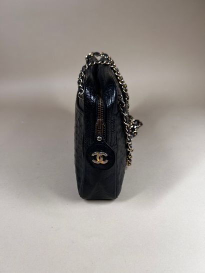 CHANEL 
Black ostrich leather 