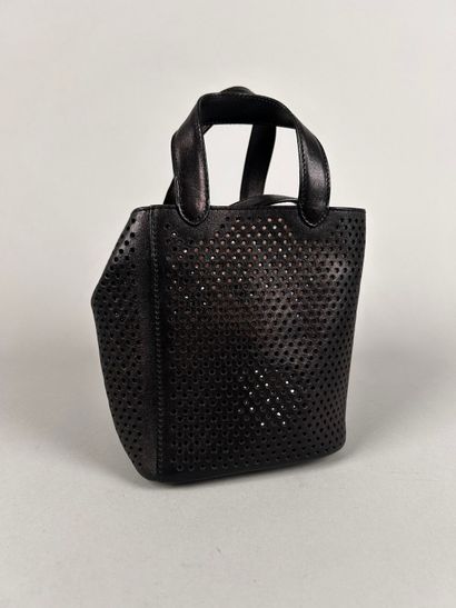 ALAIA Paris 
Mini handbag in perforated black...