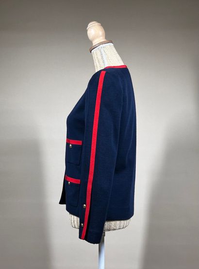 CHANEL Boutique 
Veste en jersey marine gansé...