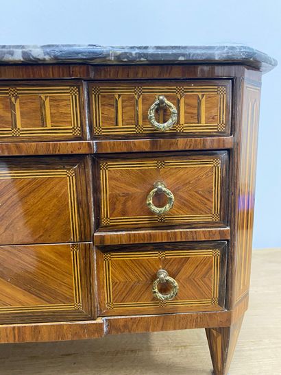 A master's chest of drawers with alternating...