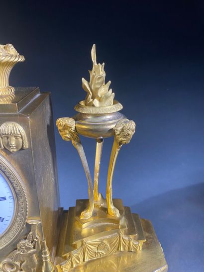 Gilt bronze and chased terminal clock decorated...