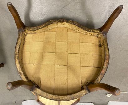 Pair of bergères in natural wood, molded...