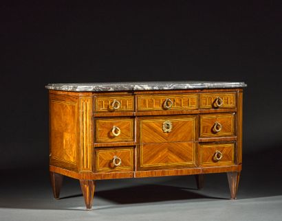 A master's chest of drawers with alternating...