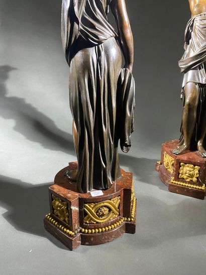Pair of large patinated bronze and gilt bronze...