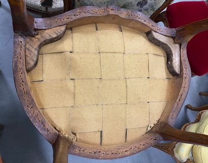 Pair of bergères in natural wood, molded...
