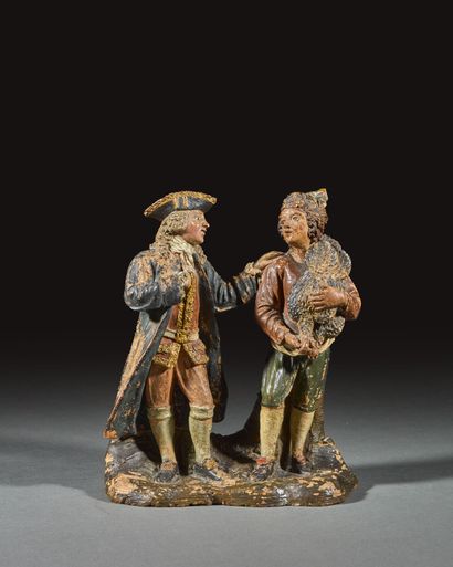 Polychrome terra cotta group depicting a...