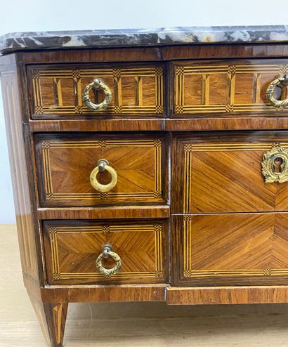 A master's chest of drawers with alternating...
