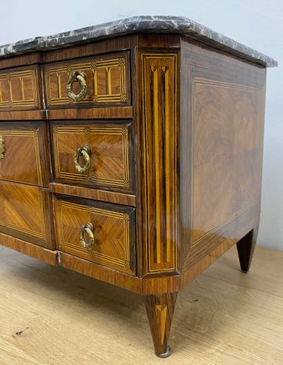A master's chest of drawers with alternating...