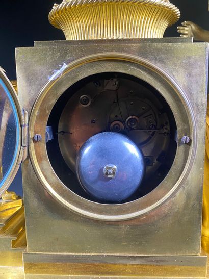 Gilt bronze and chased terminal clock decorated...