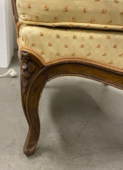 Pair of bergères in natural wood, molded...