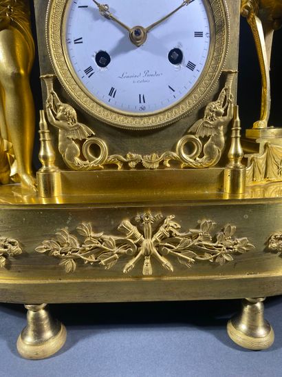 Gilt bronze and chased terminal clock decorated...